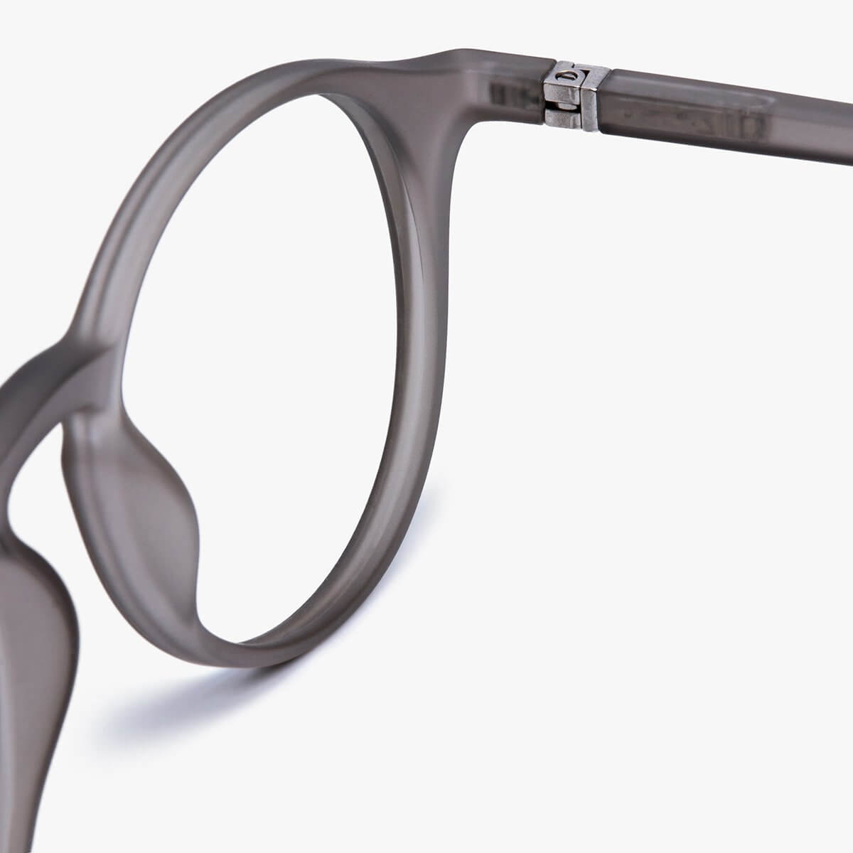 Close-up of Læsø Grey glasses with round grey translucent frame
