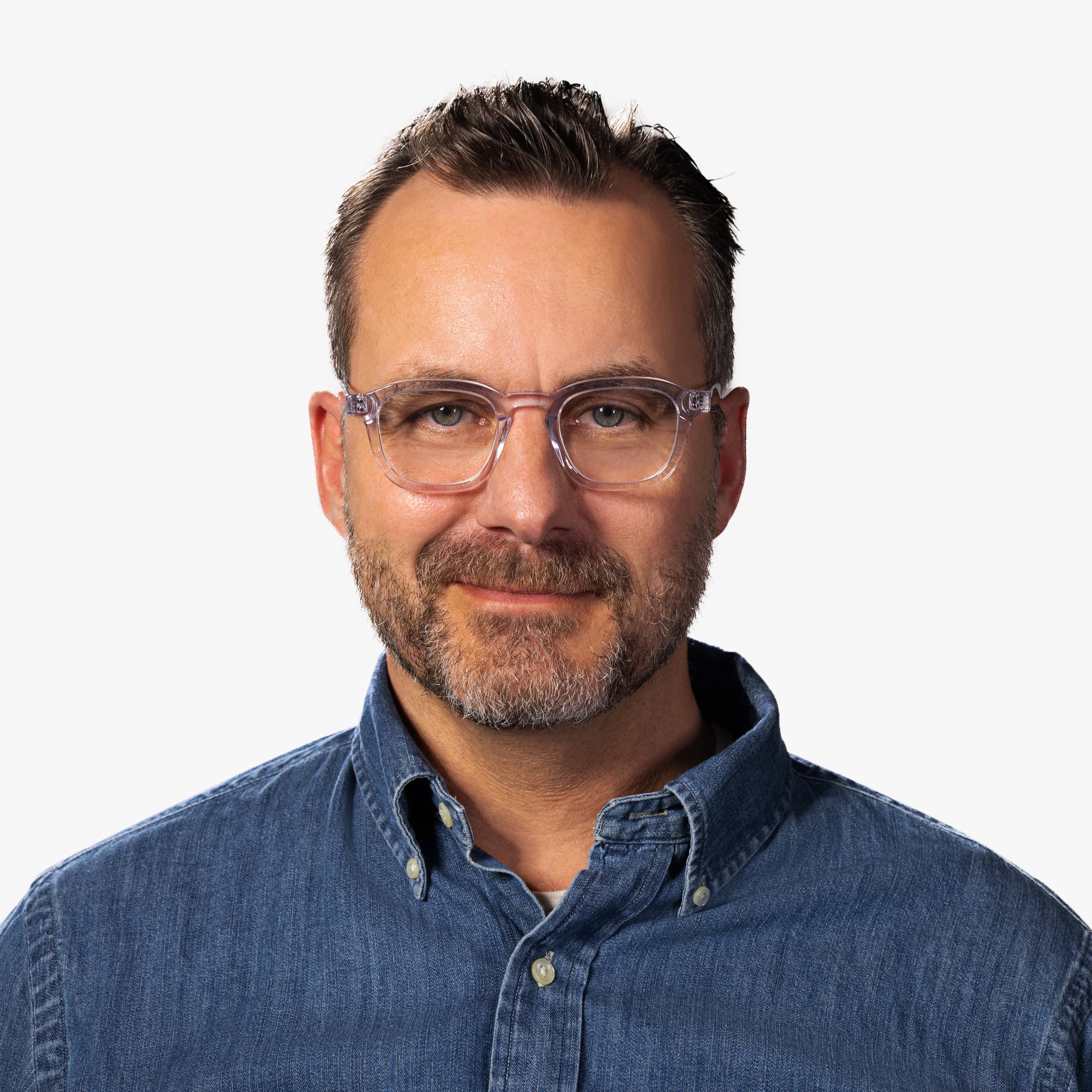 Person wearing Reykjavik Crystal White glasses