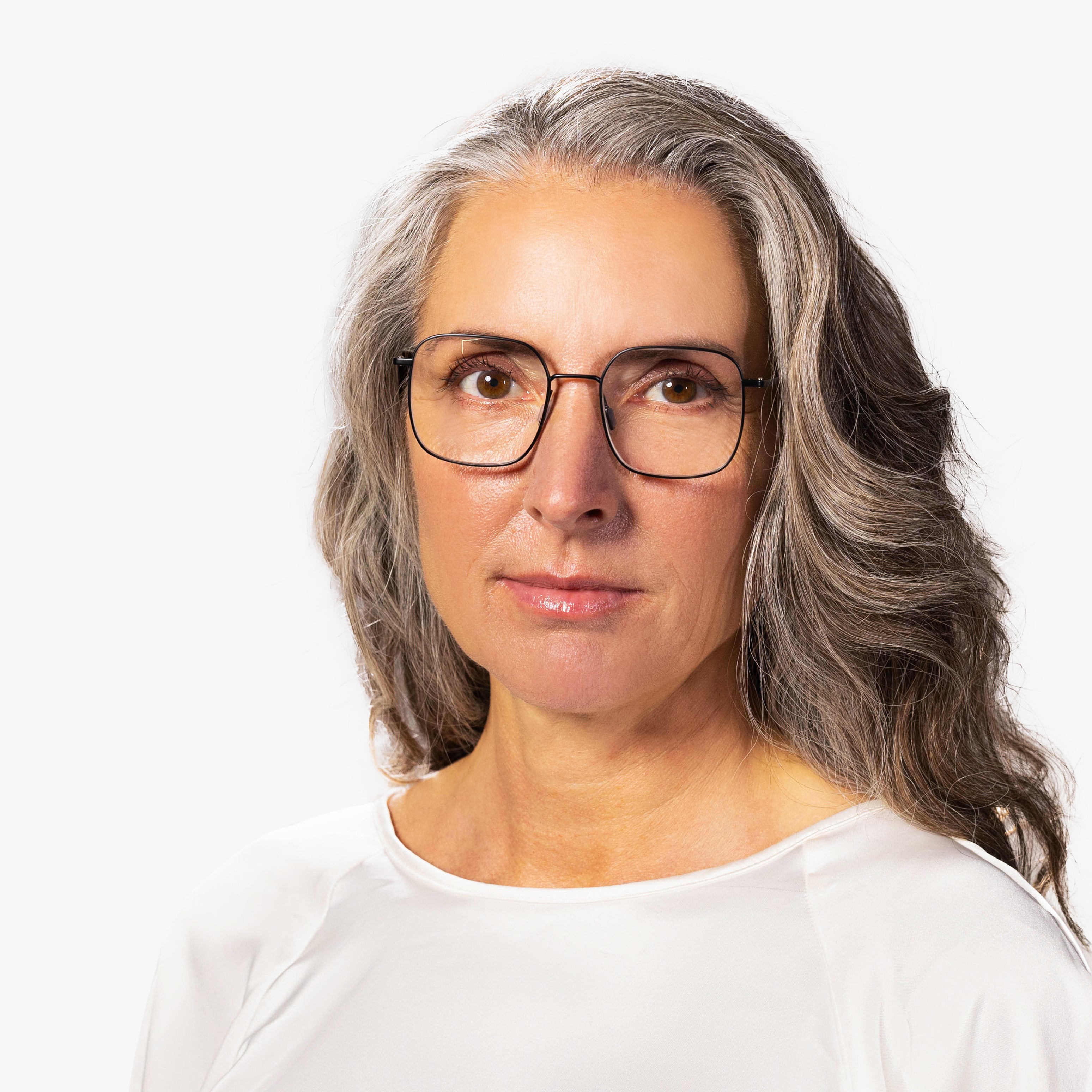 Person wearing Women's Båstad Black eyeglasses