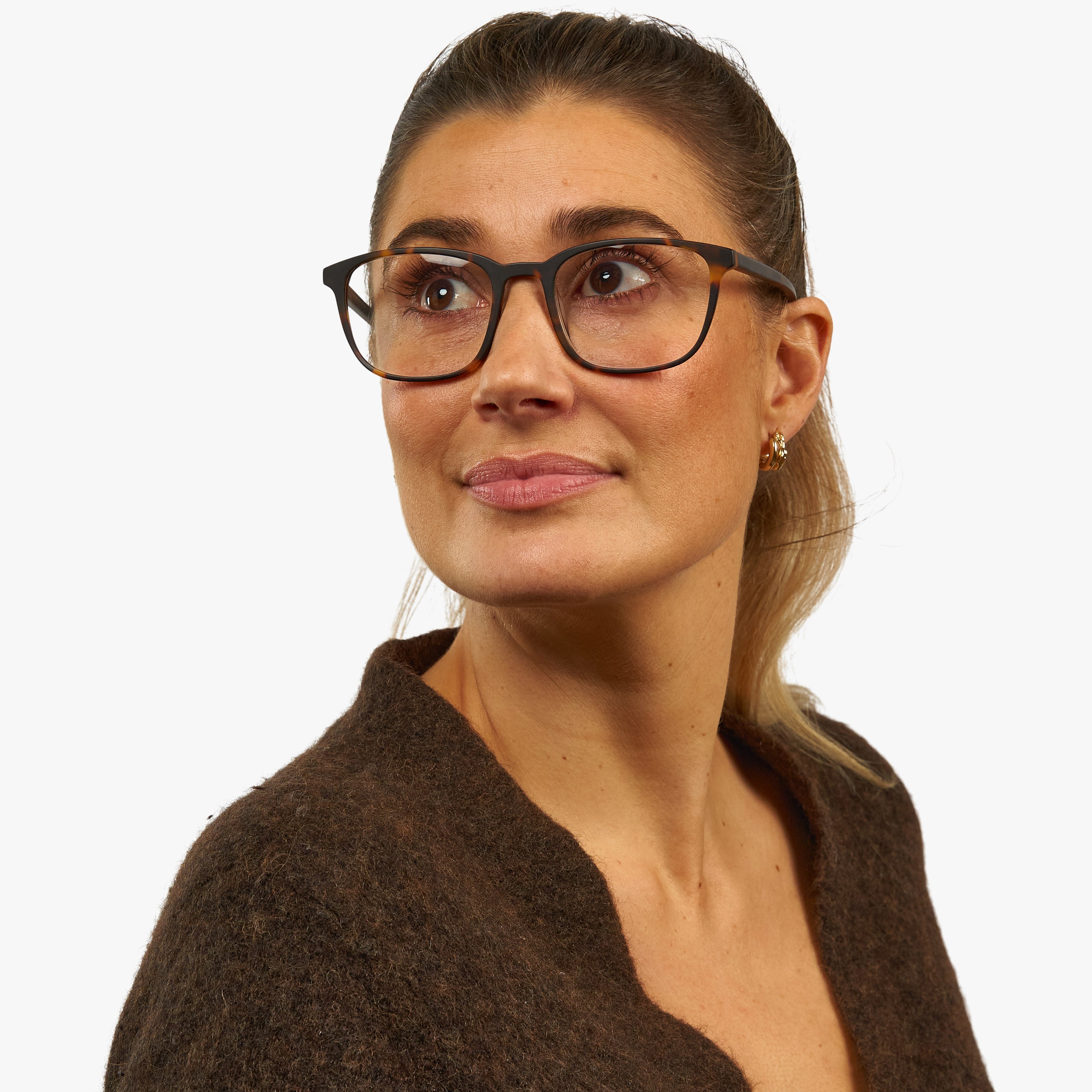 Person wearing Women's Ebeltoft Dark Turtle glasses