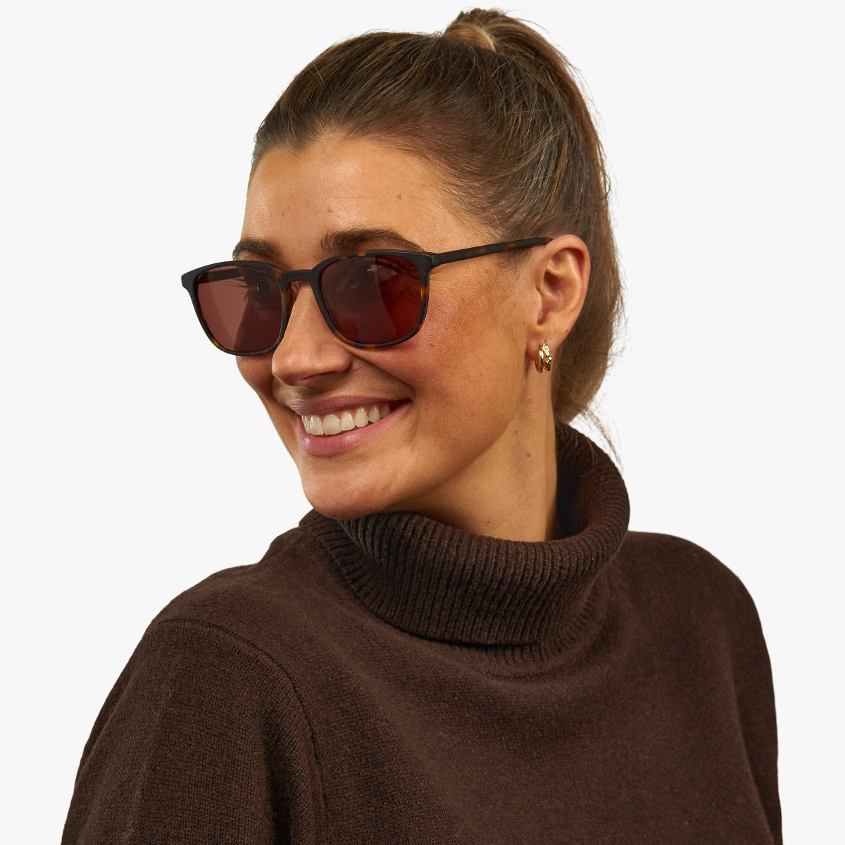 Person wearing Women's Ebeltoft Dark Turtle sunglasses
