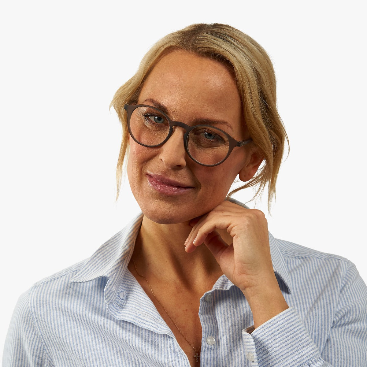 Person wearing Women's Læsø Grey reading glasses