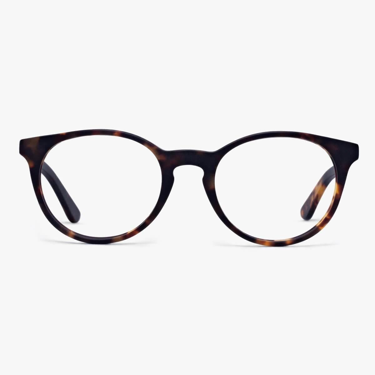 Dark tortoise shell round glasses with a classic style