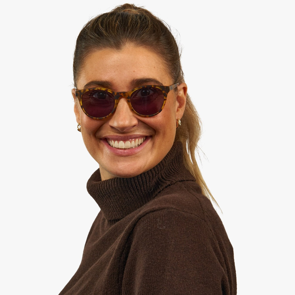 Person wearing Women's Örebro Light Turtle sunglasses