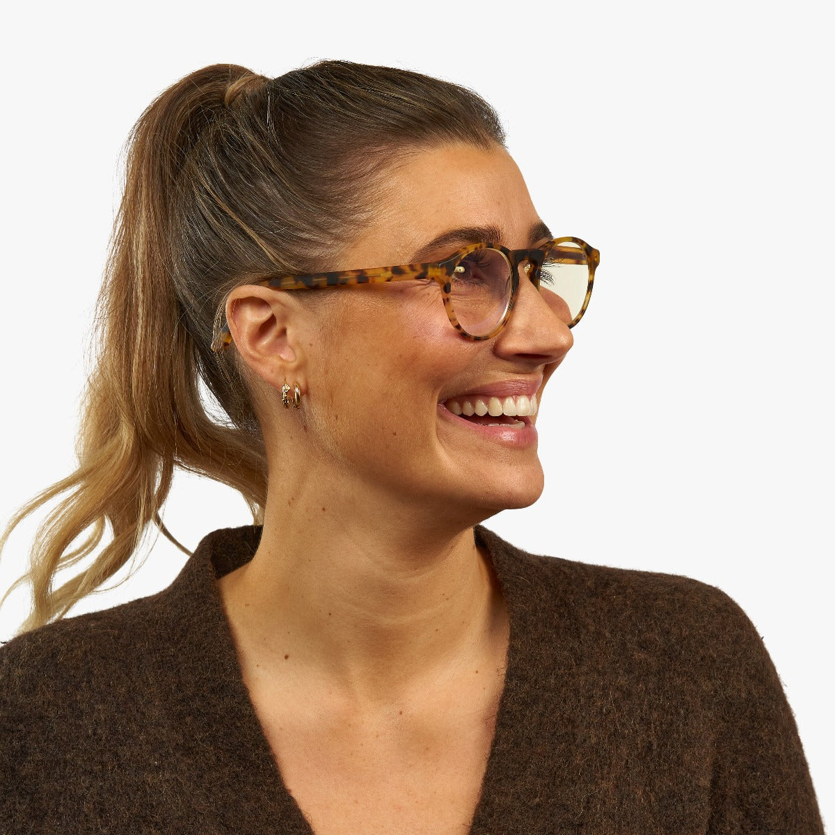 Person wearing tortoiseshell glasses